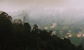 monsoon clouds over lush green palani hills in rainy season, mountain village near kodaikanal hill station Royalty Free Stock Photo