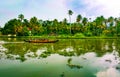 Scenic Houseboat on the backwaters during monsoon in Alleppey, Kerala, India