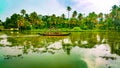 Scenic Houseboat on the backwaters during monsoon in Alleppey, Kerala, India