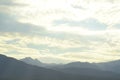 Monsoon rain clouds over mountain range edge of dry Mojave Desert valley Nevada, USA Royalty Free Stock Photo