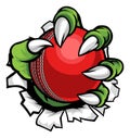 Monster or animal claw holding Cricket Ball