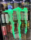 Monster energy drinks displayed in a refrigerator