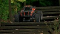 Monster truck rc car rides upstairs.