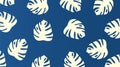 Monstera leaves on a classic blue color background