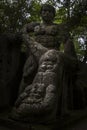 Monstrous sculpture Hercules at the famous monster park in the municipality of Bomarzo in Italy Royalty Free Stock Photo