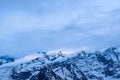 Mont Blanc in the clouds in Europe, France, the Alps, towards Chamonix, in summer, on a cloudy day