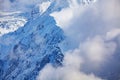 Mont Blanc massive mountains with clouds on one side, top view Royalty Free Stock Photo