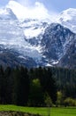 Mont Blanc Mountain covered with snow in spring. Amazing panorama with snow avalanche of French Alps in the spring.