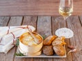 Mont d`or cheese. Traditional french recipe - La boÃÂ®te chaude. Delicious French Cheese.