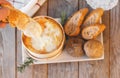 Mont d`or cheese. Traditional french recipe - La boÃÂ®te chaude. Delicious French Cheese. Royalty Free Stock Photo