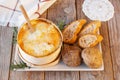 Mont d`or cheese. Traditional french recipe - La boÃÂ®te chaude. Delicious French Cheese.