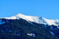 Mont Joly and its forests in Europe, France, Rhone Alpes, Savoie, Alps, in winter on a sunny day