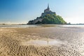 Mont Saint Michel abbey on the island in low tide, Normandy, Northern France, Europe Royalty Free Stock Photo