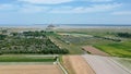 Mont-Saint-Michel, France, ascendant aeral view from the countryside