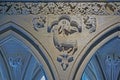 Mont-Saint-Michel cloister stone carving with sheep, staff, town symbolic elements Royalty Free Stock Photo