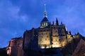 Mont saint michel monastery at night lit from beneath sunset spooky gothic