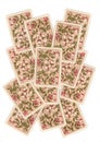 A montage of antique playing cards showing backs.