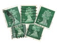 A montage of vintage green 2p postage stamps from the UK.