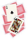 A montage of playing cards with a jack and ace of clubs revealed. Royalty Free Stock Photo