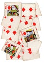 A montage of torn halves of vintage playing cards featuring diamonds.
