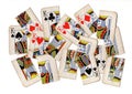A montage of torn pieces of playing cards featuring kings.
