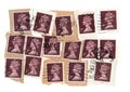 A montage of vintage 7p postage stamps from the United Kingdom.