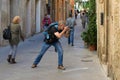 Travel-photographer on the street of old city