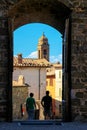 Montalcino town seen through the gate in Val d`Orcia, Tuscany, I