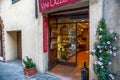 Montalcino, Tuscany, Italy. August 2020. The typical local wine shops overlook the main street of the village, primarily the Royalty Free Stock Photo