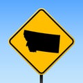 Montana map on road sign.