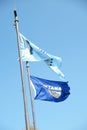 Montana state flag and Blackfeet Flag fly together. Royalty Free Stock Photo