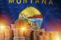 Montana US state flag and big amount of golden bitcoin coins and trading platform chart. Crypto currency Royalty Free Stock Photo