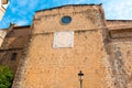 MONTBRIO DEL CAMP, SPAIN - JUNE 6, 2016: Old sundial on a building wall in Montbrio del Camp, Tarragona, Catalunya, Spain. Royalty Free Stock Photo