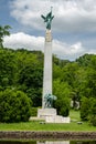 Closeup of the historic Memorial Obelisk at Edgemont Memorial Park. A tall obelisk with bronze
