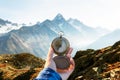 Monte Bianco mountains range and tourist hand with old metal compass