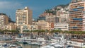 Monte Carlo city aerial panorama timelapse. View of luxury yachts and apartments in harbor of Monaco, Cote d'Azur.