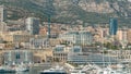 Monte Carlo city aerial panorama timelapse. View of luxury yachts and buildings in harbor of Monaco, Cote d'Azur.