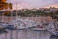 Monte Carlo, Monaco, 10/05/2019: Beautiful pink sunset in a marina. Dear luxury yachts