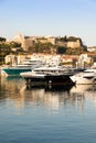 Monte Carlo, Monaco - Port Hercule with luxury yachts, boats, and scenery skyline Royalty Free Stock Photo