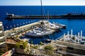 Monte Carlo, Monaco 29.11.2020 Sailing boats yachts and modern vessels in port on seascape background Royalty Free Stock Photo