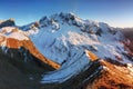 Monte Cernera in autumn with first snow, Dolomites, Italy, Europe Beautiful mountains scenery in sunset. Royalty Free Stock Photo