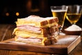 monte cristo sandwich with a wooden backdrop