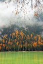 Monte Piana or Monte Piano, with beautiful autumn colors seen from the shore of Lake Landro. Royalty Free Stock Photo