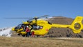 Monte Pora. Italy. Rescue helicopter ready to take off from a mountain meadow. First aid helicopter. Medical rescue helicopter