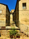 Montecassiano town, Marche region, Italy. Medieval buildings, precious ancient street, light and shadow, history and time Royalty Free Stock Photo