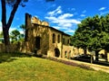 Montecassiano town, Marche region, Italy. Medieval buildings, fortification and arch, light and shadows, beauty, history and time