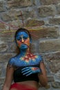 Montefiorino Modena, Italy : 2015 05 01 queen's day public event face painting portrait on model brunette face