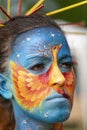 Montefiorino Modena, Italy : 2015 05 01 queen's day public event face painting portrait on model brunette face