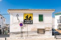 Montefrio, Spain; September 25th 2021: Old house in square with an Old advertising poster of Nitrate of Chile that can still be