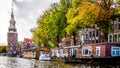 The Montelbaanstoren Montelbaans Tower, built in 1516 on the banks of the Oudeschans Canal in the old city center of Amsterdam Royalty Free Stock Photo